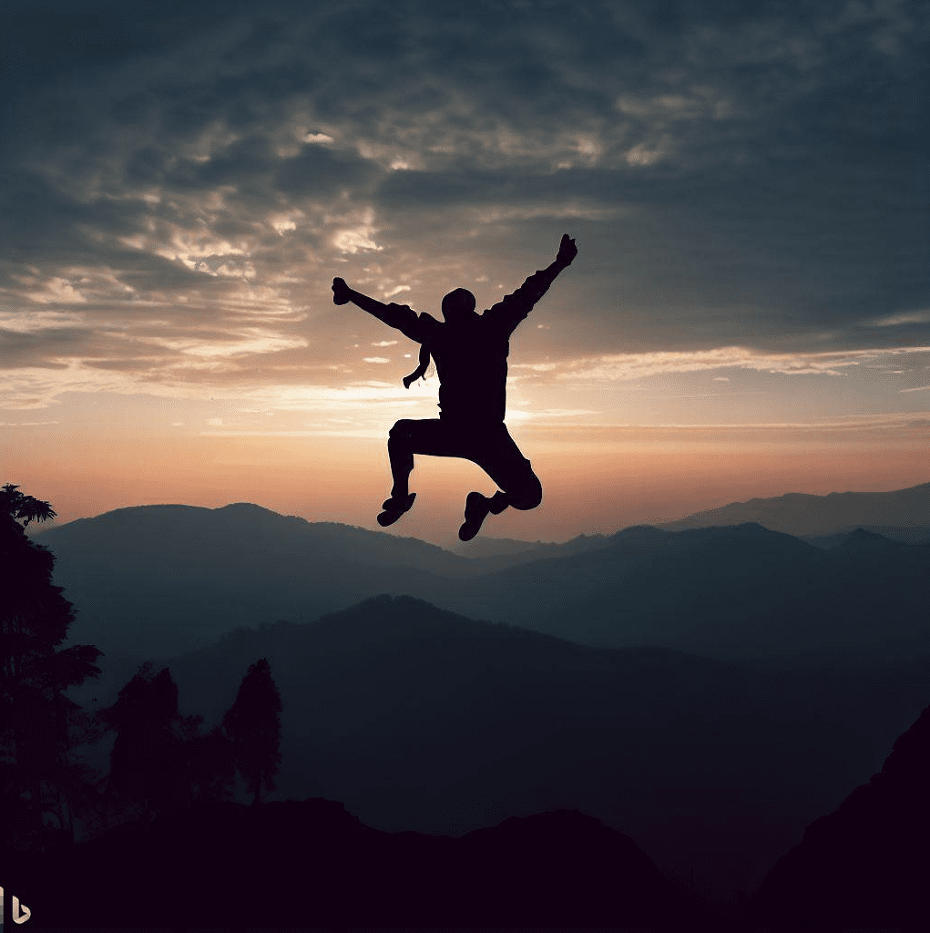 Man jumping to success sunset